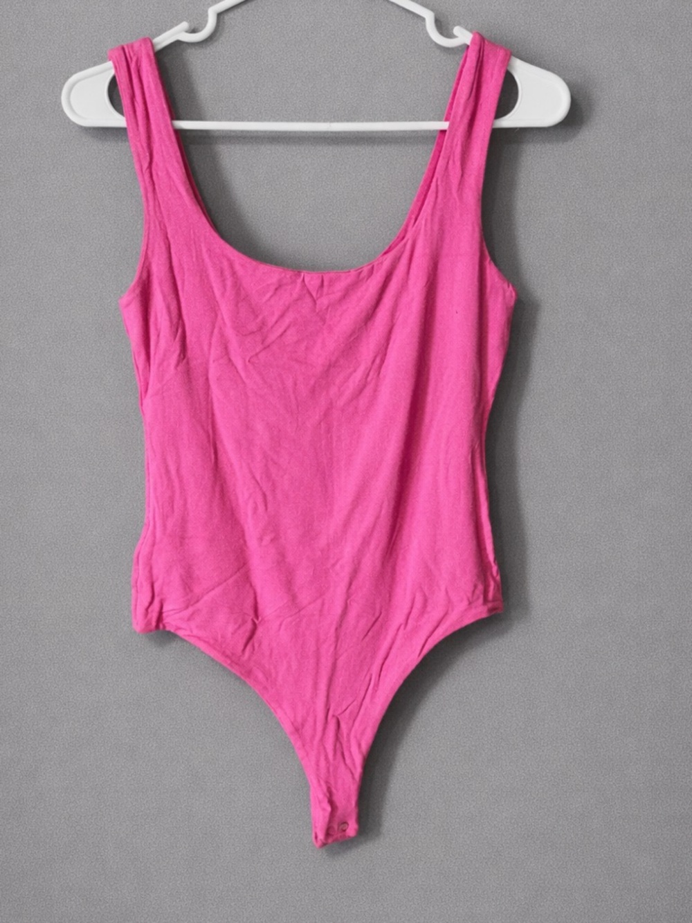 Naked wardrobe pink thong style bodysuit